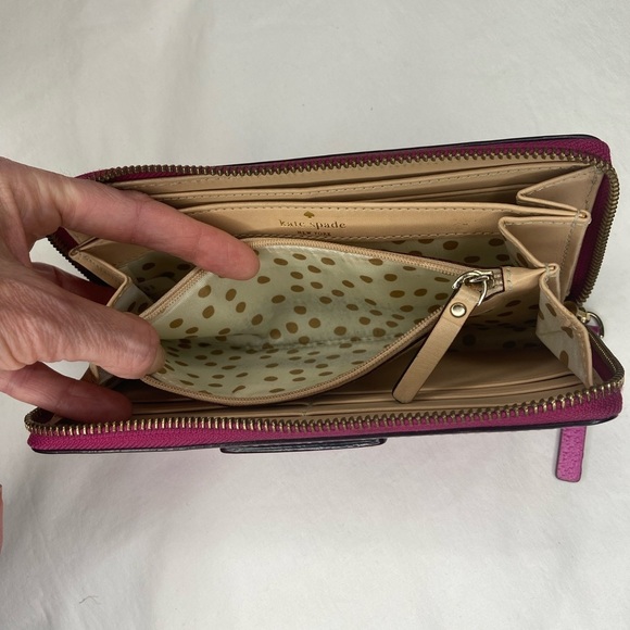 Leather Zip Around Wallet by Kate Spade in magenta.

Length: 7.75",  Height: 4" - Picture 4 of 6